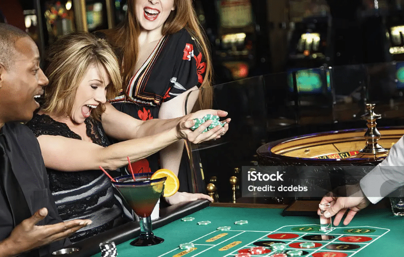 A diverse group playing games at a Casino