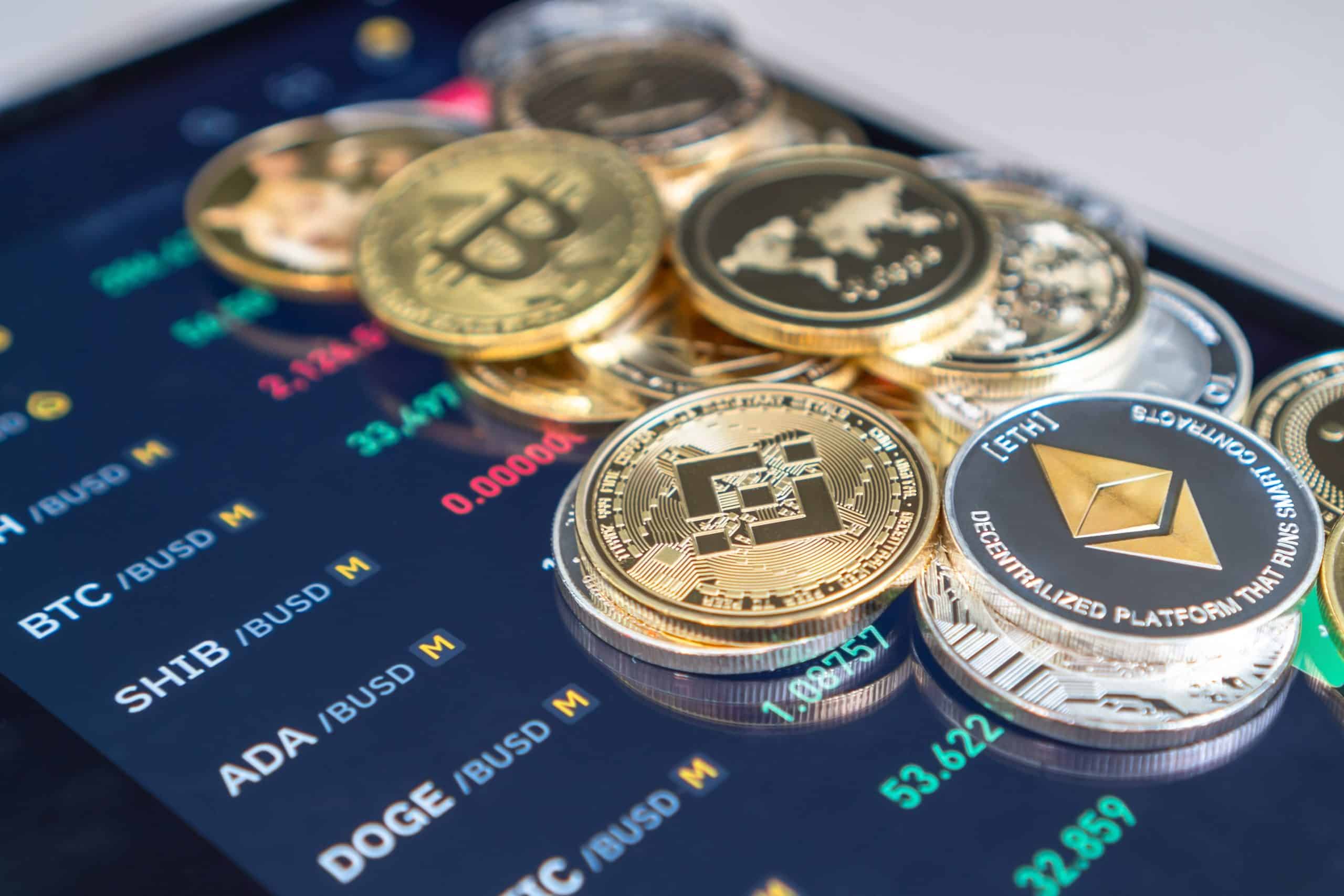 phone with crypto coins on it