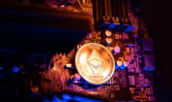 ETH coin on a motherboard