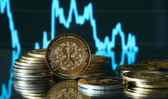 XRP tokens in front of price chart