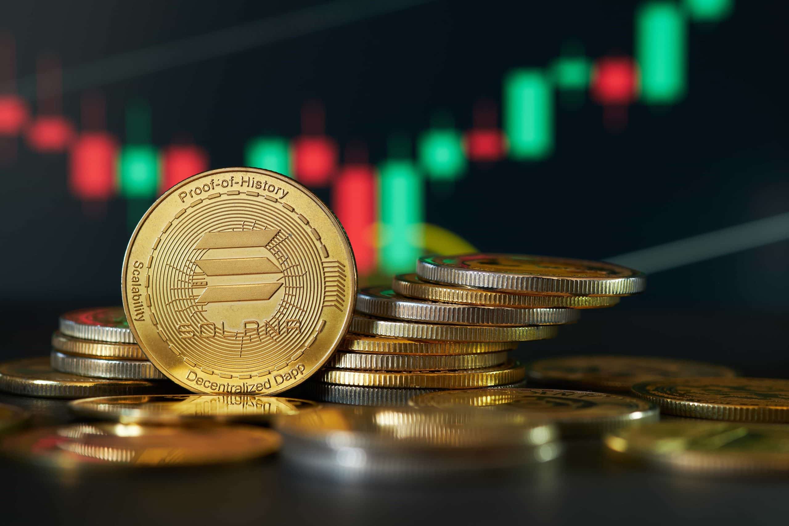 Solana coin in front of price chart