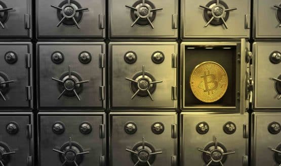 Bitcoin coin in a vault
